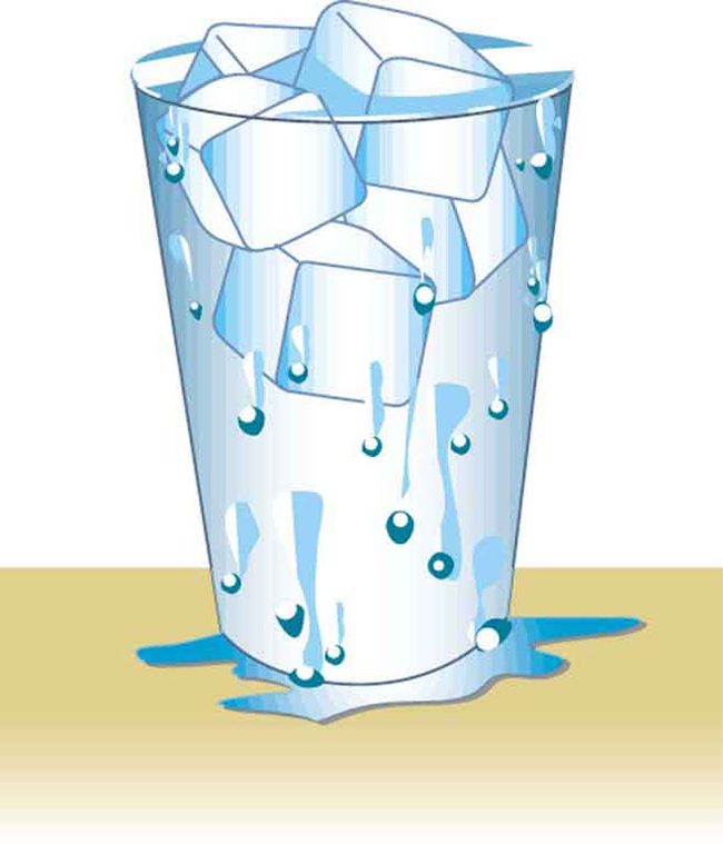 A glass filled to the brim with water and ice cubes.