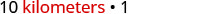 The text '10 kilometers multiplied by '1' is displayed on a white background, with 'kilometers' in red and '10' and '1' in black. The overall aesthetic is clean and minimalist.