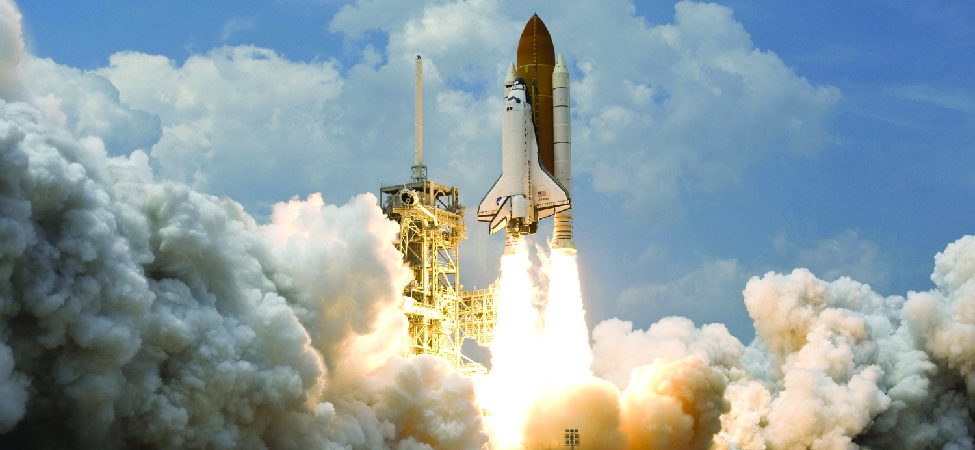 A photo of a rocket ship being launched into space.