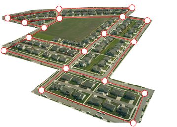 The same aerial photograph with every street traced by a red line and a white dot placed at each intersection, so the road network is reduced to dots joined by lines.